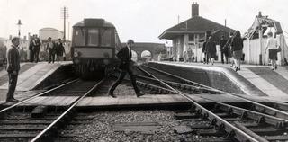 Network Rail is reinstating double track on much of the Cotswold Line rail route between Oxford and Worcester, which was singled in the early 1970s. Passengers cross the tracks at Charlbury station in May 1967.