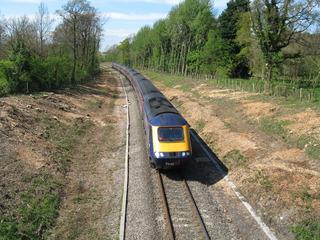 Network Rail is reinstating double track on much of the Cotswold Line. A First Great Western HST is pictured climbing from the Vale of Evesham to Chipping Campden tunnel after vegetation clearance on the route in early 2009.