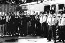 Firefighters and footballers with the Milk Cup at the launch of Fire Safety Week in 1986