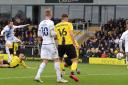 Nathan Holland puts Oxford United 2-0 up at Burton Albion Picture: Richard Parkes