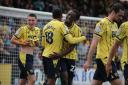 Greg Leigh celebrating while playing for Oxford United.