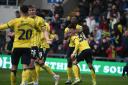 Oxford United players celebrate their late winner at the weekend