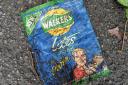 The litter pickers found a 25-year-old 'Cheese ad Owen' flavour crisp packet