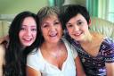 Author Debrah Martin at home with daughters Aislinn, 15, left, and Laura, 20