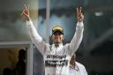 Lewis Hamilton celebrates winning his second world championship with victory in Sunday’s Abu Dhabi Grand Prix