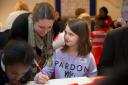 Learning: Ellise Watson, 11, with mentor Christine Moor at the IntoUniversity launch event last week