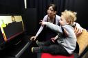Research: Dr Nayeli Gonzalez-Gomez with Harry Pilling, two, in the Eye-Tracker room