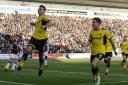 Ryan Ledson celebrates putting Oxford United in front from the penalty spot  Pictures: David Fleming