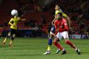 Oxford United's Jon Obika battles for the ball with Ezri Konsa at Charlton Athletic  Picture: David Fleming