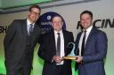 TOP HONOUR: William Reddy (centre) receives his Dedication to Racing award from presenter Ed Chamberlin and Michael Owen Picture: Dan Abraham-focusonracing.com