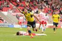 James Henry celebrates scoring Oxford United's winner at Doncaster Rovers  Picture: James Williamson