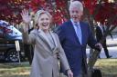 Democratic presidential candidate Hillary Clinton, and her husband former President Bill Clinton, greet supporters after voting in Chappaqua, N.Y., Tuesday, Nov. 8, 2016. (AP Photo/Seth Wenig).