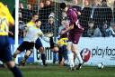 Jack Midson dives in to put Oxford United 2-0 ahead at Chelmsford on Saturday