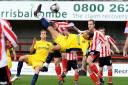 United’s Franny Green lets fly with a spectacular overhead scissors shot against Altrincham