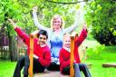 St Christopher’s Primary School teacher Michele Harris with Omair Ahmed, left, and Larisha Wells pictured on the bridge