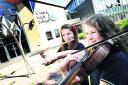 Amy Aron-Muellbauer, left, and Mila Ferramosca will be playing for The Queen at a Jubilee concert