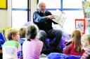 Ron Heapy reads to the children during the readathon