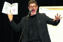 SHOUT IT OUT: Mo Willems reads one of his stories to primary school children
