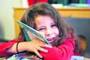ENTHUSED: Aaliyah Flynn, six, from Cutteslowe Primary School, Oxford, where pupils have been reading Project X Code books