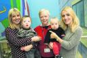 Rowena Pearce, centre, advanced nurse practitioner for children with disability, pictured with, left, Nina Lawson and Jon-Paul, four, and Nicole Marsh and James, eight months. Picture: OX63442 Antony Moore