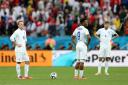 England's Wayne Rooney (left), Daniel Sturridge (centre) and Steven Gerrard stand dejected after Luis Suarez scoring  Uruguay's first goal