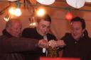Jim Smith, Mark Wells and David Cameron switch on the lights