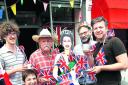 From left, Drew Brammer of OxFork, Gill Jaggers from Pegasus Theatre, photographer Chris King, councillor Craig Simmons and Ian Nolan of the Old Boot Factory get together in Magdelen Road to prepare for the East Oxford Jubilee street party