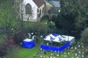 Police in the grounds of All Saints’ Church, Didcot, following the discovery of Jayden Parkinson’s body in a disturbed grave