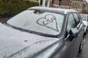 Heart scrawled on snow-covered windscreen praises LTNs