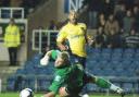 Oxford United substitute Franny Green beats Ebbsfleet keeper Lance Cronin, but sees his shot go wide of the far post