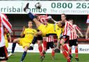 United’s Franny Green lets fly with a spectacular overhead scissors shot against Altrincham