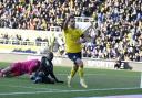 Sam Baldock wheels away after giving Oxford United the lead Picture: David Fleming