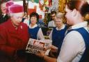 Queen Elizabeth II visits D&J Bromilow Newsagents in Berinsfield to pick up a copy of the Oxford Mail in 1997.