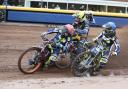 Scott Nicholls (left) leads the way in the first heat, as Alfie Bowtell (centre) crashed out Picture: Steve Edmunds