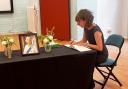 Anneliese Dodds signing the book of condolence in Oxford Town Hall