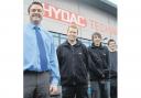 Manager Steffan Grieve with apprentices