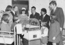 Pupils are shown the incubator they helped to buy in The Cherwell School spina bifida unit at the Radcliffe Infirmary in 1970