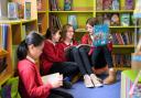 Children at St Francis Primary School using the new library