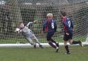 Abingdon goalkeeper Alfie Kingsbury manages to keep out this effort from Marston’s Rowan Alexander