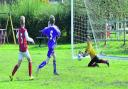 Didcot keeper Dylan Dawson saves a shot from Botley’s William Slade