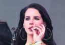 Making a habit of it... Lana Del Rey smoking on stage at Glastonbury earlier this year
