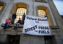 The protest at Oxford University’s admissions office, in Broad Street, this week against fossil fuels. Picture: Damian Halliwell.