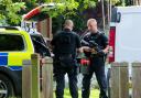 Armed police in University Parks as the hunt continued for Jed Allen in connection with murder of three people in Didcot. Picture: Damian Halliwell