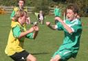 Kidlington's Josh Pipkin and Thomas Farrell go for the ball in their Under 14 C League contest