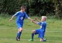 Abingdon’s Dillan Grice (left) celebrates with teammate Ben Lisemore after scoring the first of his two goals in the Under 12 victory over Bardwell