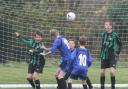 Cumnor’s Matthew Davies (No 17) goes close to scoring with a header in his team’s exciting 4-3 win over Combe in the Under 13 B League