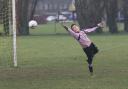 Oxford Blackbirds Under 13 keeper Mikolaj Thompson makes a flying save to deny Horspath