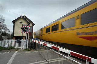 Network Rail's high-speed New Measurement Train passes over Ascott-under-Wychwood level crossing on an inspection run from Worcester to Oxford on April 15, 2010.