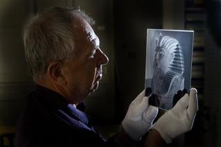 Dr Jaromir Malek holds one of the archaeologists' original glass negatives