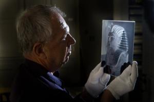 Dr Jaromir Malek holds one of the archaeologists' original glass negatives